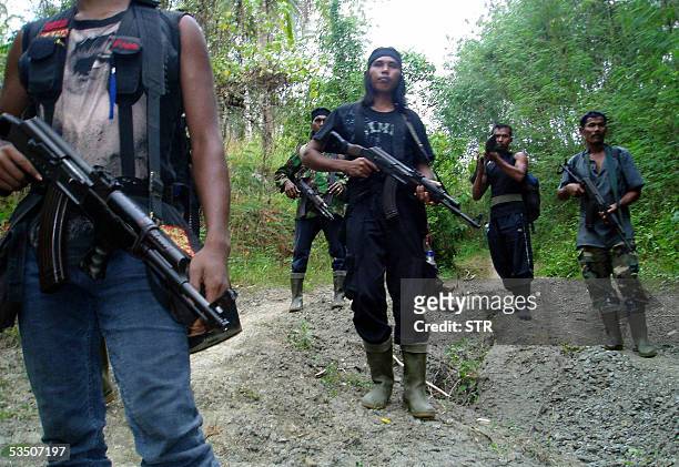 Several free Aceh movement personnel of Batee Lhiek territory at one Bireuen district forest region, 29 August 2005. According to the Batee Lhiek...