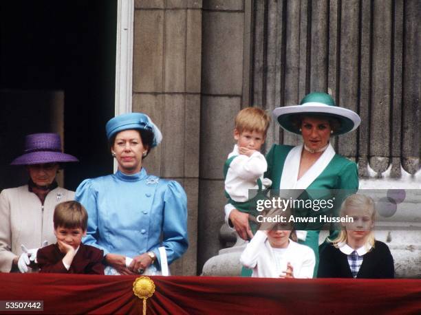 Princess Margaret, Countess of Snowdon, Prince William, Lady Rose Windsor, Diana, Princess of Wales, wearing a green dress with a white collar and...