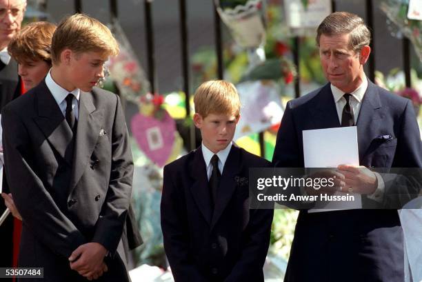 Charles, Prince of Wales, Prince William and Prince Harry stand outside Westminster Abbey at the funeral of Diana, Princess of Wales on September 6,...