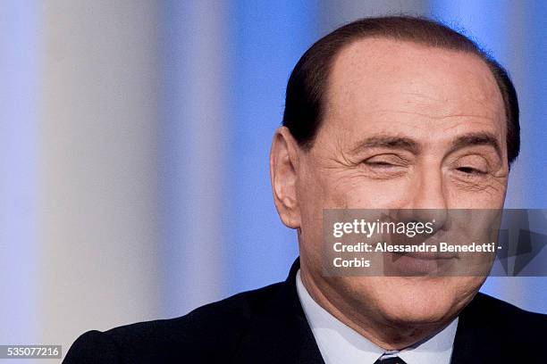 Silvio Berlusconi, leader of Italy's center-right coalition Forza Italia, attends the Italian political debate show Porta a Porta, at Rai's broadcast...