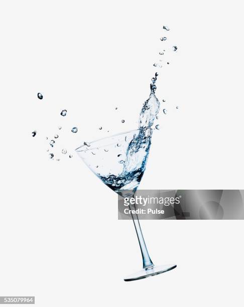 martini glass. - splashing cocktail stock pictures, royalty-free photos & images