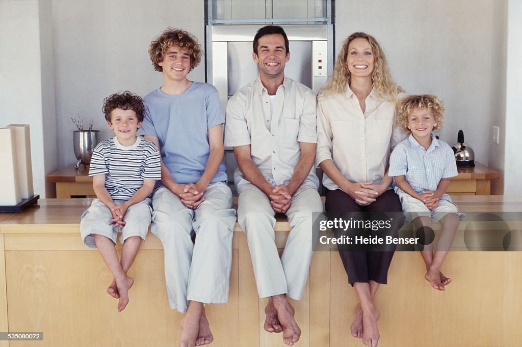 Family sitting side by side