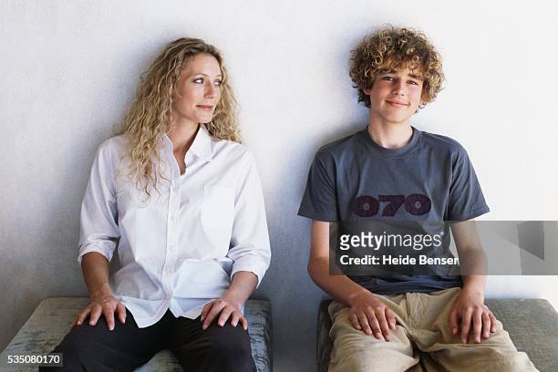 mother looking at son - boy happy blonde stock pictures, royalty-free photos & images