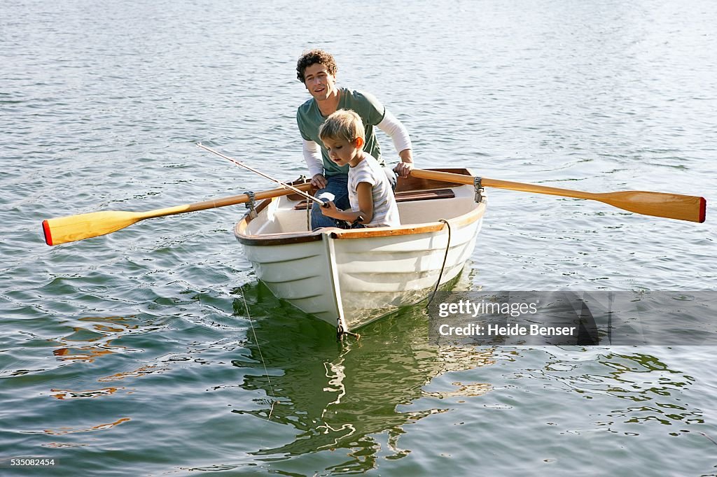 Father and son in rowboat