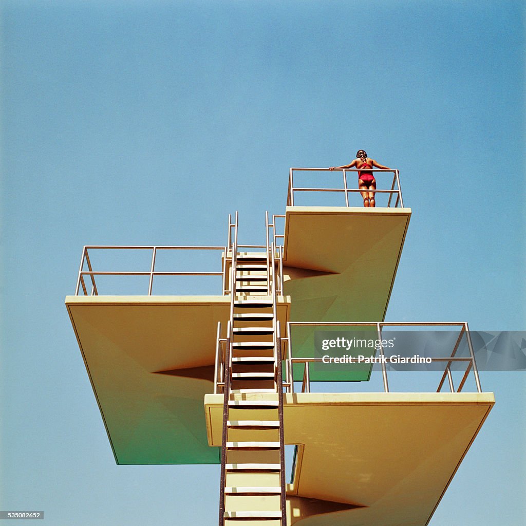 Woman Standing on Diving Platform