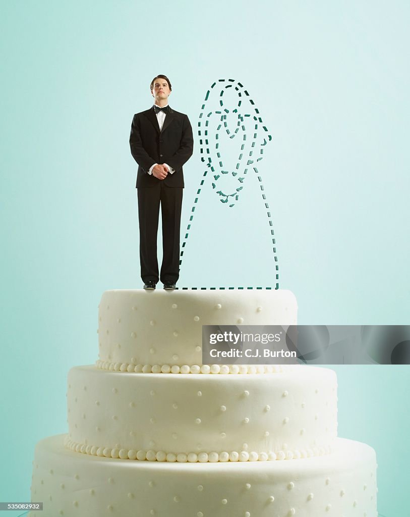 Groom On Top Of Wedding Cake High-Res Stock Photo - Getty Images