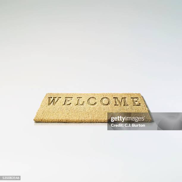 welcome mat - zerbino foto e immagini stock