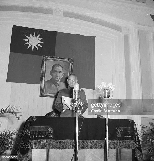 Taipei, Formosa: Generalissimo Chiang Kai-shek is shown informing a group of high officials that he has decided to resume the presidency of China....