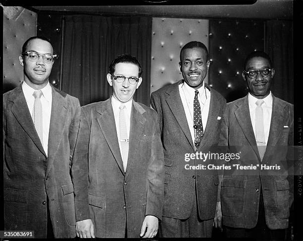 Group portrait of Leroy Brown and the Brown Buddies band, with bass player Bobby Boswell, pianist George 'Duke' Spaulding, Leroy Brown wearing...
