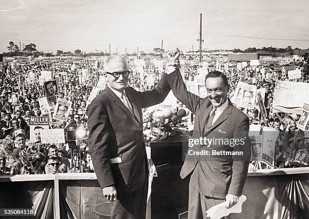 Lockport,NY- -: Senator Barry Goldwater raises the arm of his running mate William Miller during a rally here 9/5 that officially kicked off Miller's...