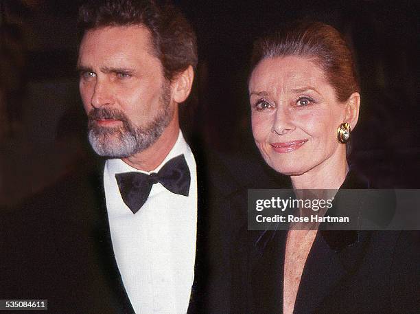 Long-time campanions Dutch actor Robert Wolders and British actress Audrey Hepburn attend a gala at the Waldorf Astoria Hotel, New York, New York,...