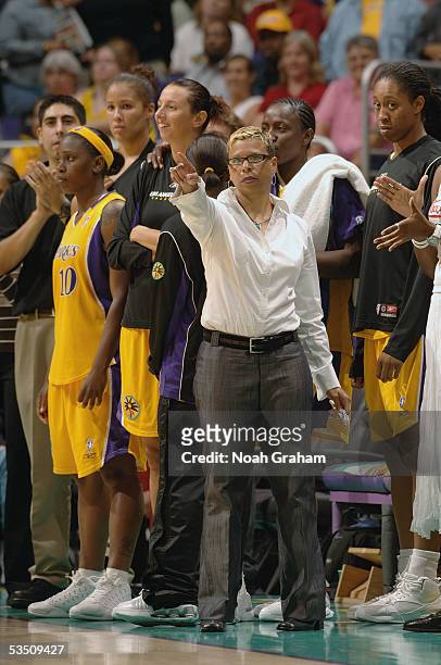 Assistant Coach Shelley Patterson of the Los Angeles Sparks signals out into the court during a game against the Detroit Shock on August 19, 2005 at...