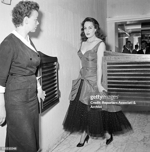 Greek-born Italian actress Yvonne Sanson attending a cocktail party held by Titanus at the restaurant Palazzi. Rome, 10th June 1955