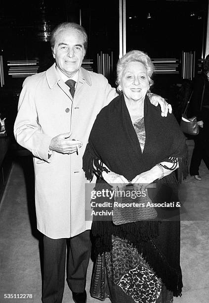 Italian actor Rossano Brazzi and his wife Lidia Bertolini attending the presentation of the TV movie La promessa. 1979
