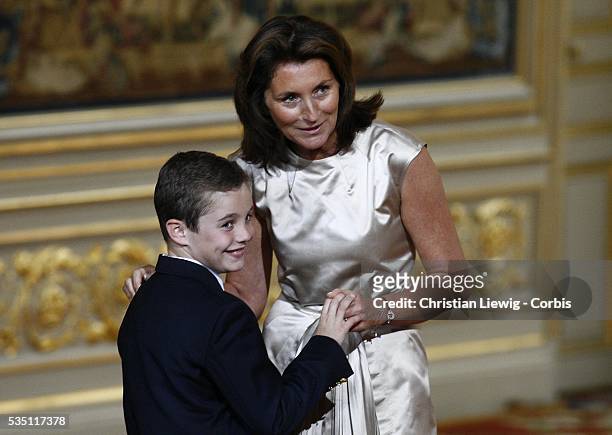 French President Nicolas Sarkozy's wife Cecilia and their son Louis.