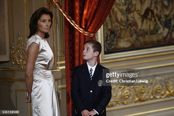 French President Nicolas Sarkozy's wife Cecilia and their son Louis.