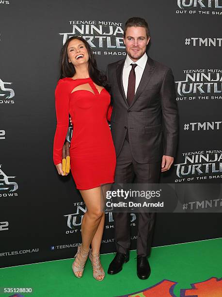 Cassandra Jean and Stephen Amell attends the Australian Premiere of Teenage Mutant Ninja Turtles 2 at Event Cinemas George Street on May 29, 2016 in...