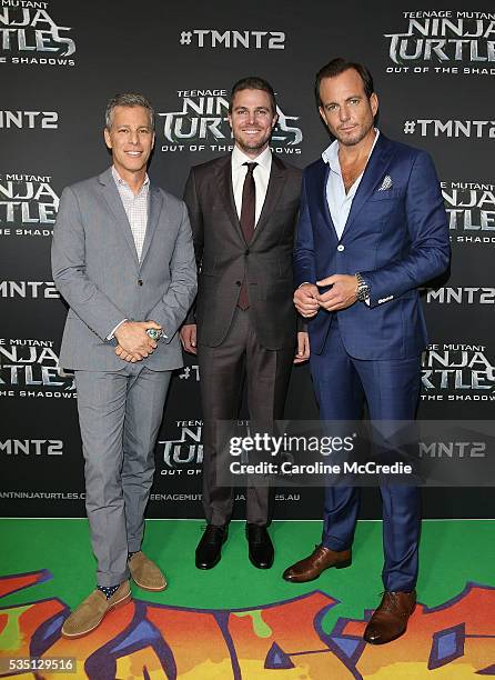 Brad Fuller, Stephen Amell and Will Arnett arrive ahead of the Australian premiere of Teenage Mutant Ninja Turtles 2 at Event Cinemas George Street...