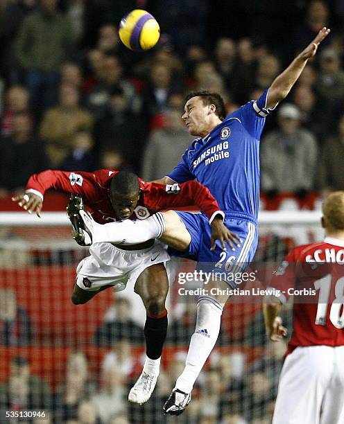John Terry of Chelsea and Louis Saha of Manchester during the English Premier League match Manchester United vs. Chelsea in Manchester, England, UK.