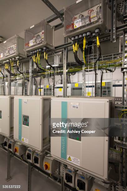 inverters for the solar panels on the roof of the crystal building - siemens stock pictures, royalty-free photos & images