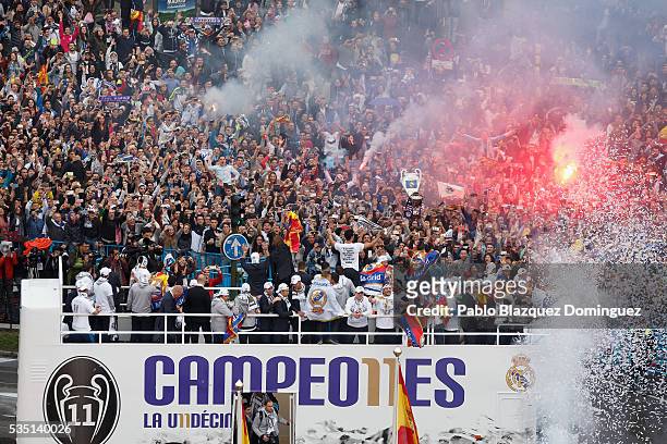 Real Madrid CF players celebrate with their fans at Cibeles Square after winning the Uefa Champions League Final match against Club Atletico de...