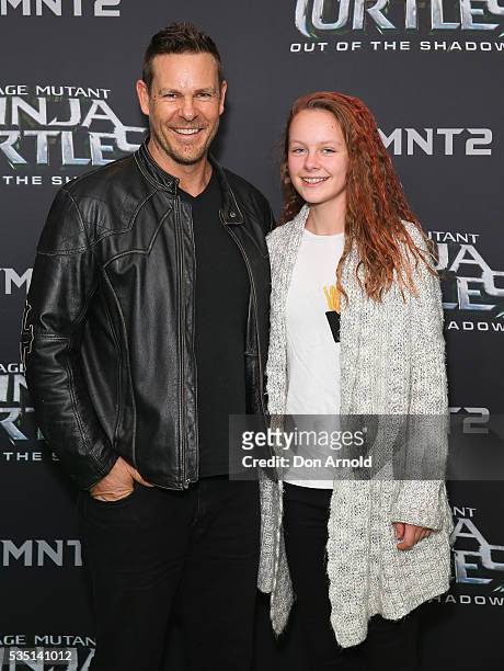 Aaron Jeffrey and guest attend the Australian Premiere of Teenage Mutant Ninja Turtles 2 at Event Cinemas George Street on May 29, 2016 in Sydney,...