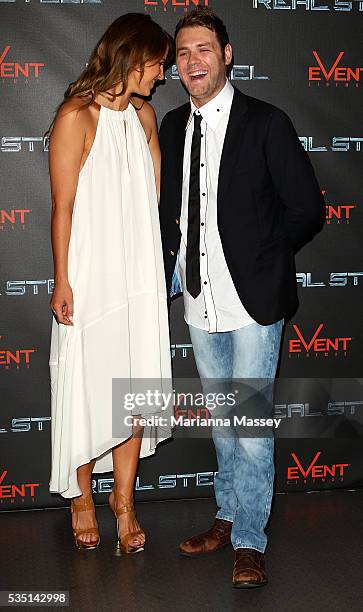 Vogue Williams and Singer Brian McFadden pose on the red carpet at the Australian premiere of 'Real Steel' at Event Cinemas on September 28, 2011 in...