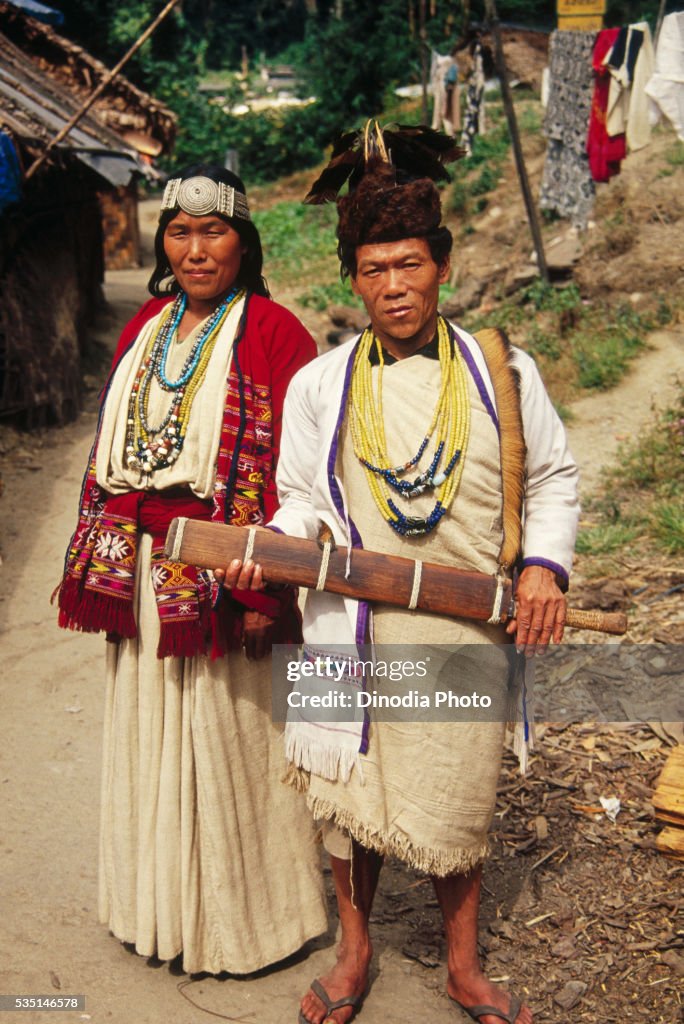 Mmiji couple wearing traditional dress in Arunachal Pradesh, India.