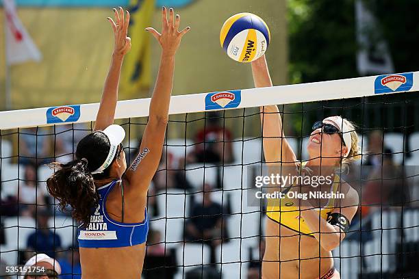 Talita Da Rocha Antunes of Brazil and Karla Borger of Germany duel at the net during a game between Brazil and Germany on day 5 of the FIVB Moscow...