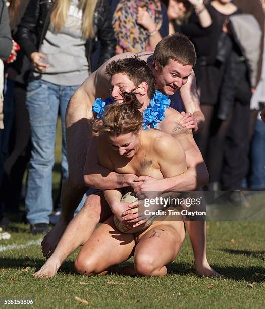 Rachel Scott is tackled during the 'Nude Blacks' versus a Fijian invitation side played at Logan Park, Dunedin as an unofficial curtain raiser match...