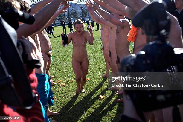 Guard of honour from team mates for Rachel Scott from Dunedin who was names player of the match during the 'Nude Blacks' versus a Fijian invitation...