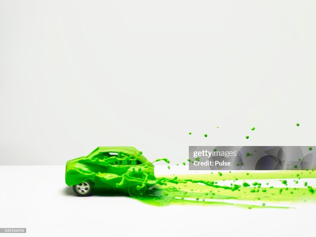 Green liquid on car.