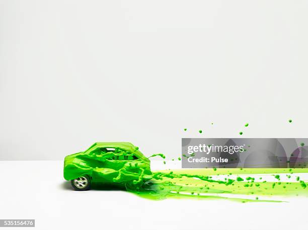 green liquid on car. - vintage racing driver stock pictures, royalty-free photos & images