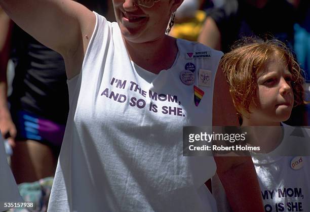 Woman wearing a T-shirt with the slogan: 'I'm the mom and so is she' at the 1993 Gay Freedom Day Parade in San Francisco.