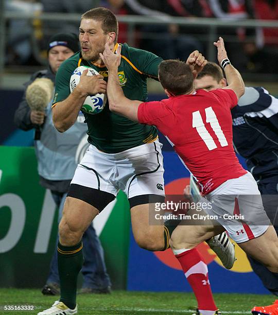 Frans Steyn, South Africa, holds off the challenge of Shane Williams to score a try during the Wales V South Africa, Pool D match during the Rugby...