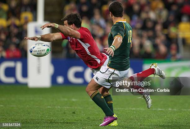 IMike Phillips, Wales, charges down a kick from Morne Steyn during the Wales V South Africa, Pool D match during the Rugby World Cup in Wellington,...