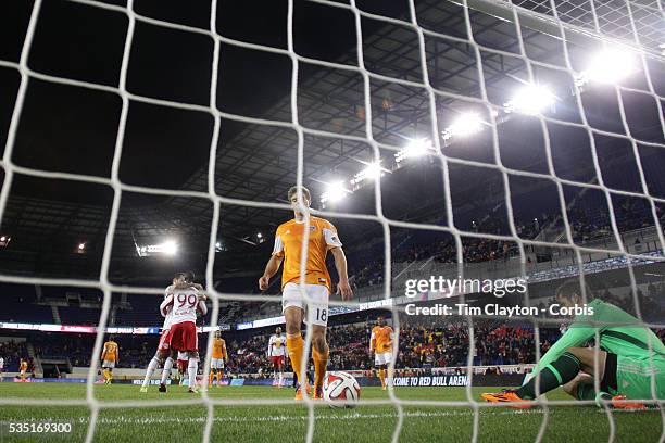 Bradley Wright-Phillips, New York Red Bulls, completes his hat-trick from the penalty spot beating Houston Dynamo goalkeeper Tally Hall during the...