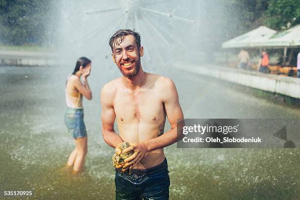 holi festival - women in wet tee shirts stock pictures, royalty-free photos & images