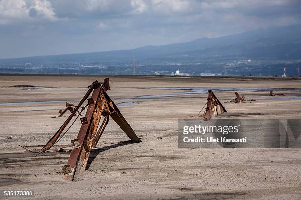 General view of a destroyed factory by mudflow during the tenth anniversary of the mudflow eruption on May 29, 2016 in Sidoarjo, East Java,...