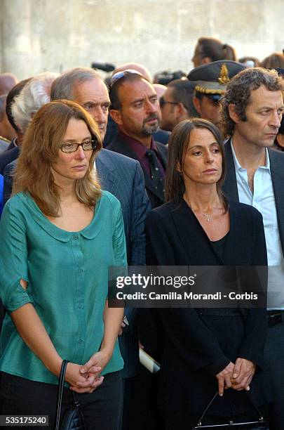 Italian opera tenor legend Luciano Pavarotti's wife Nicoletta Mantovani and his doughter Lorenza Pavarotti wait during his funeral outside the Dome...