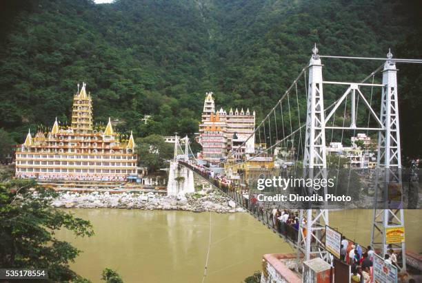 lakshman jhula in rishikesh, uttaranchal, india - rishikesh stock pictures, royalty-free photos & images