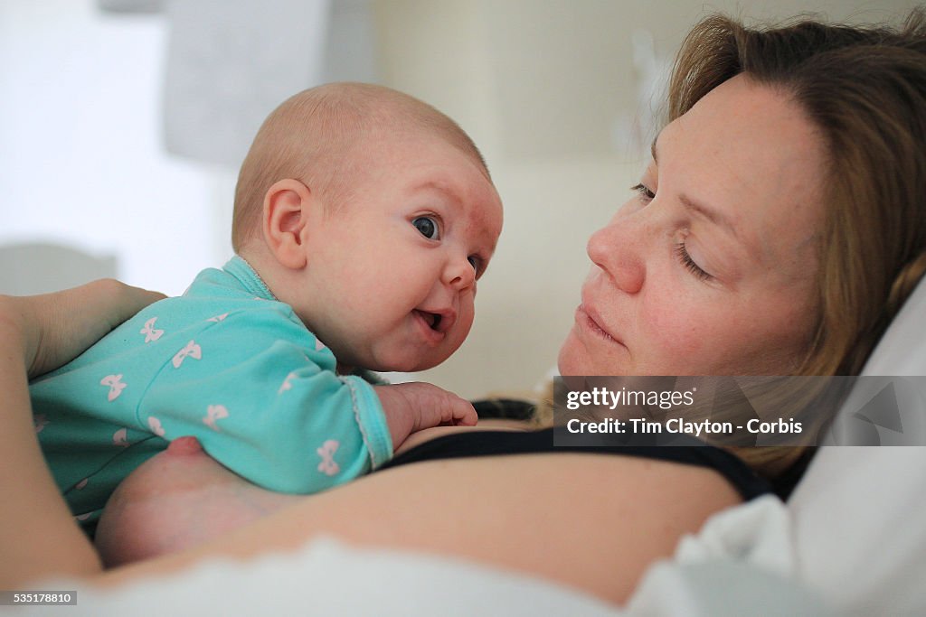 A two month old baby girl and mother.