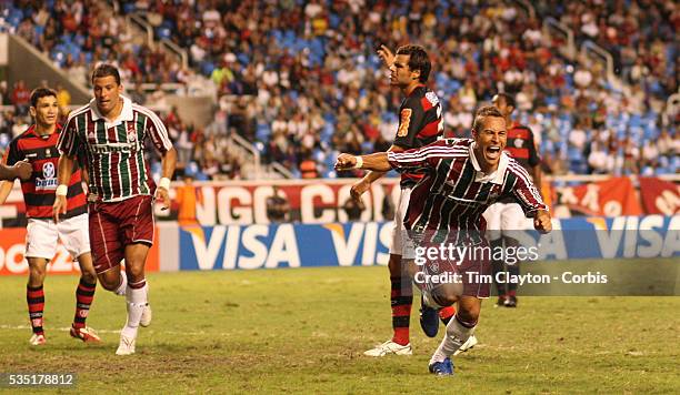 Fluminense striker Rodriguinho celebrates after scoring his sides third goal during the Flamengo V Fluminense, Futebol Brasileirao League match at...