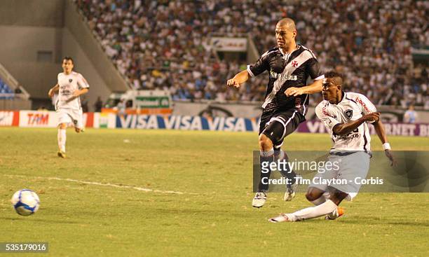 Botafogo striker Maicosuel injures himself while shooting during the Botafogo V Vasco, Futebol Brasileirao League match at Estadio Olímpico Joao...