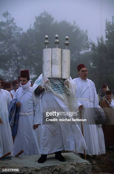 ?Chavouot? Pilgrimage on the mount Gerizim, . The high priest with the sepher thora