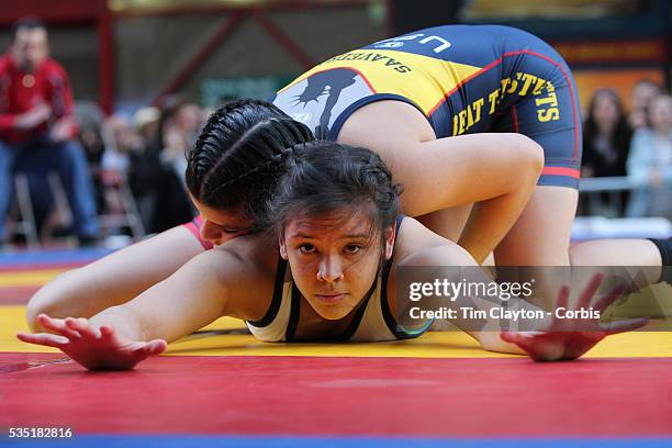 Girl wrestlers Samantha Oye-Gonzalez, New York City, in action against Nazareth Saavedra, , New Jersey, during the 'Beat The Streets' USA Vs The...