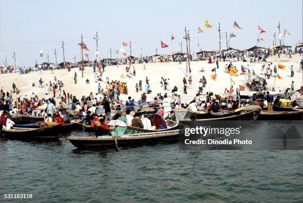 boats or ferries on the banks of ganges during the ardh kumbh mela, one of the world's largest religious festivals at allahabad, uttar pradesh, india. - allahabad ストックフォトと画像