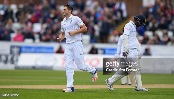 England bowler Chris Woakes celebrates after dismissing Dimuth Karunaratne during day three of the 2nd Investec Test match between England and Sri...