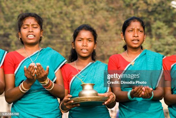 traditional welcome performed to a guest by santhal tribe in dumka, jharkhand, india. - santhal stock pictures, royalty-free photos & images