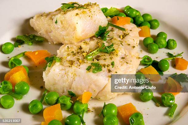 close-up of a dish of filleted fish - filleted stock pictures, royalty-free photos & images